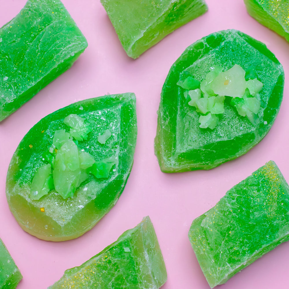 Coconut Pandan Jade classic-cut crystal candies on a pink background