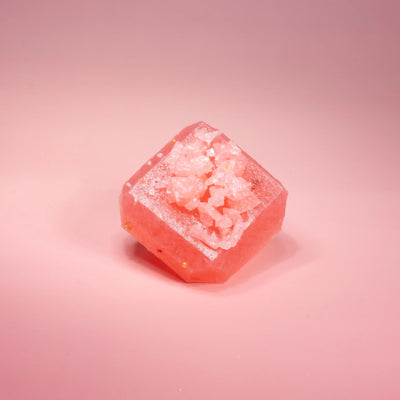 Pink Love at First Bite crystal candy on a pink background