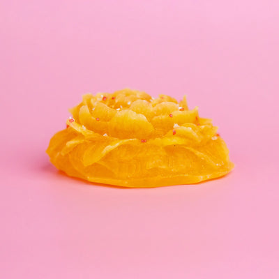 Peony Dream flower-shaped crystal candy on a pink background