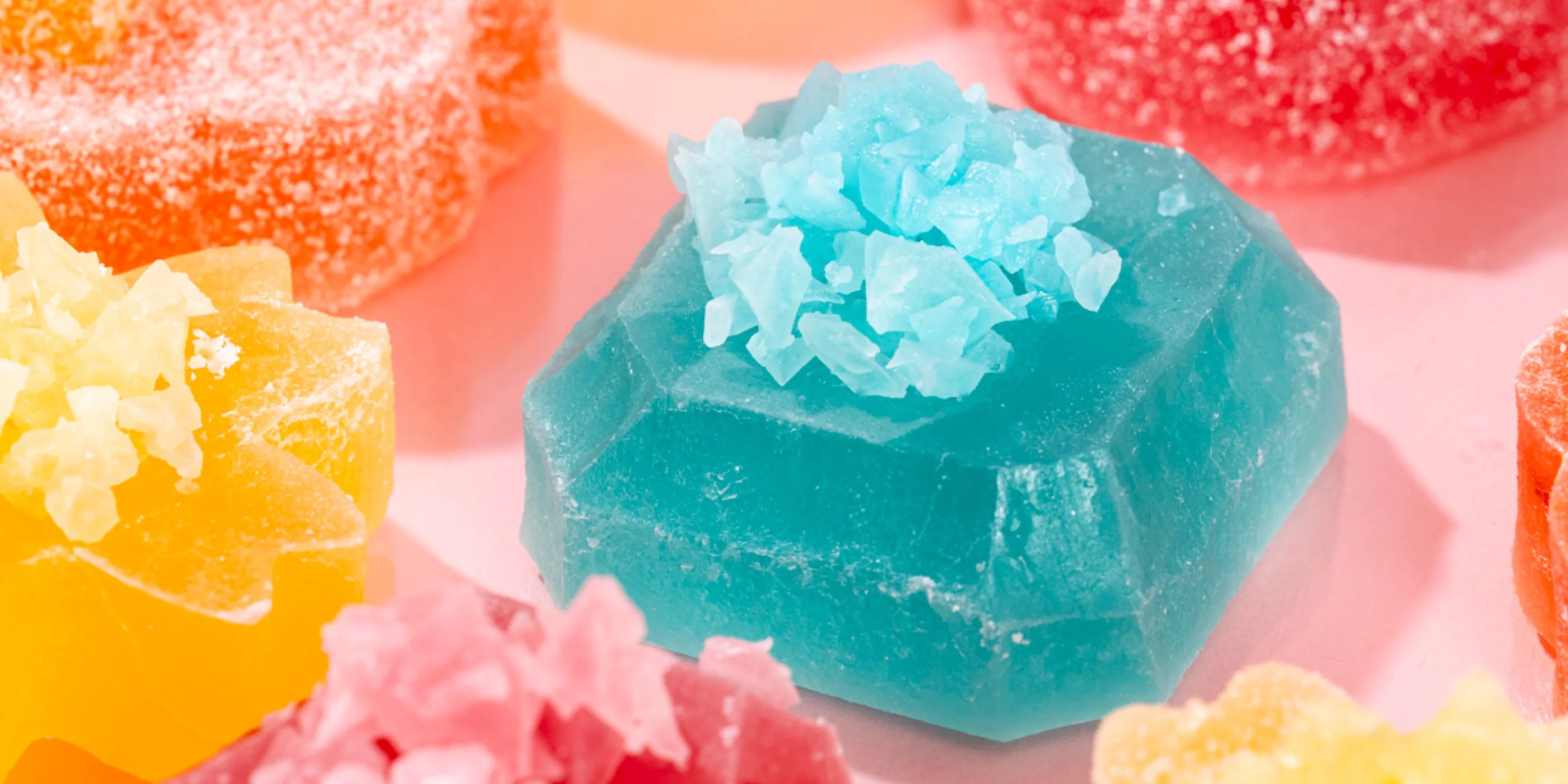 Colorful candy-like rocks with a blue rock in the center